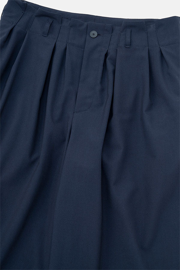 Wide tuck pants