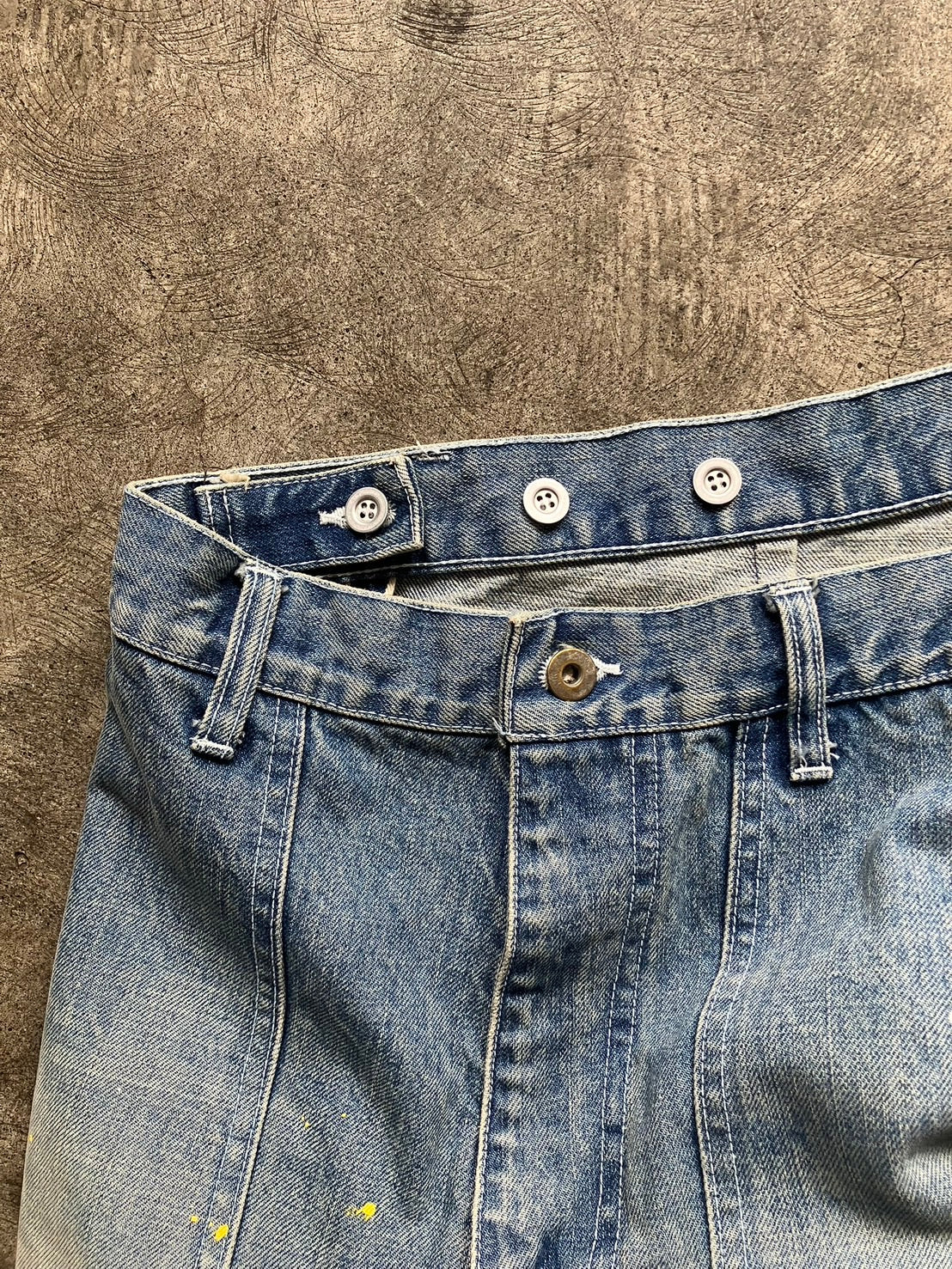 Distressed painter jeans