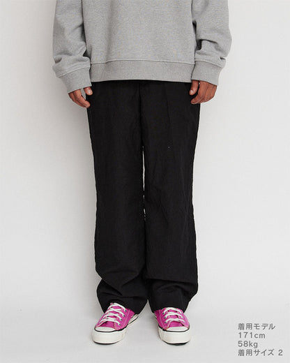 In tuck pants garment wash