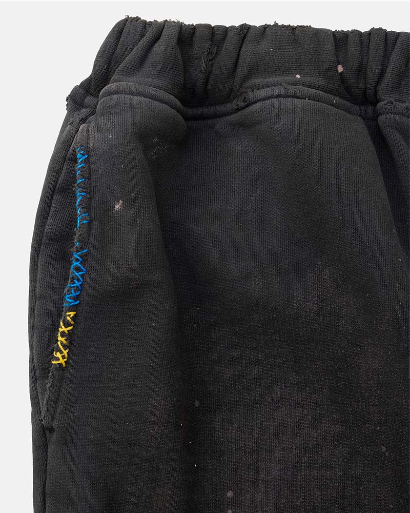 Distressed sweat pants
