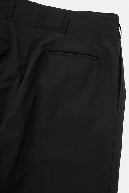Wide tuck pants